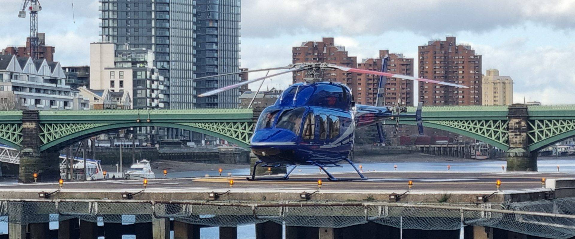 Helicopter sitting on the pad at London Heliport