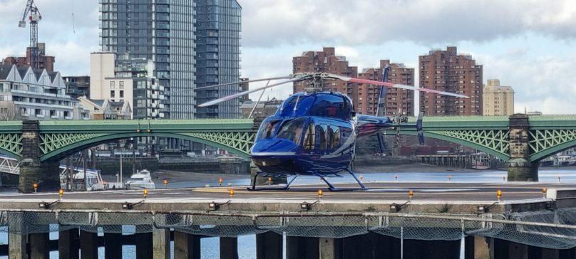 Helicopter sitting on the pad at London Heliport