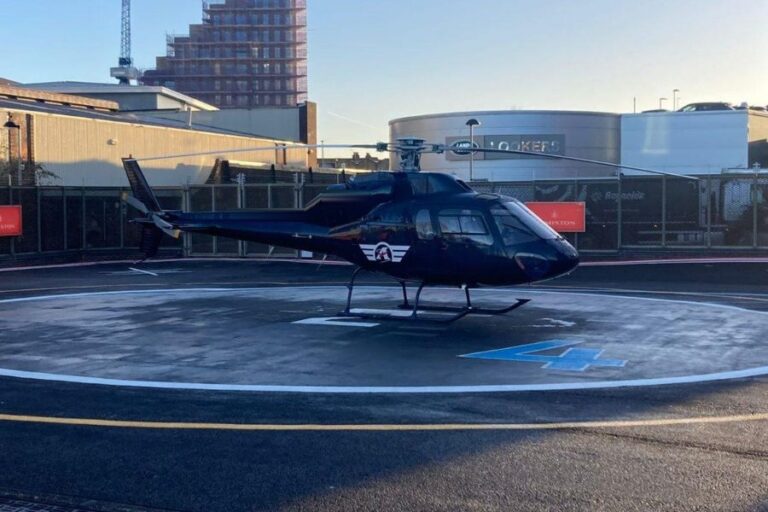 Eurocopter AS355 Twin Squirrel twin-engine helicopter on the helipad at London Heliport, Battersea