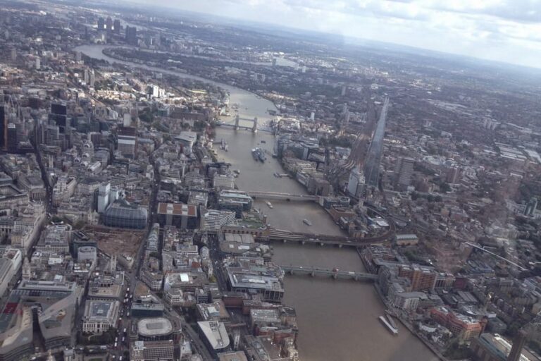 Aerial view of the River Thames and its bridges through central London from a helicopter