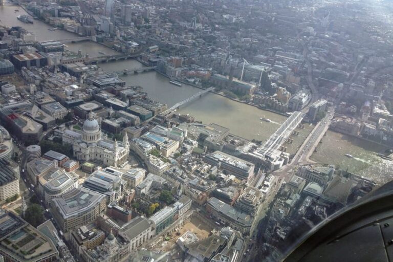 Aerial view of St Paul’s Cathedral, the Millennium Bridge and the River Thames in central London, seen from a helicopter